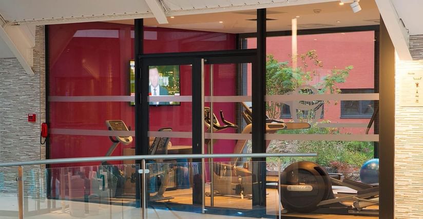 Indoor gym area with equipment at Oceania Paris Roissy CDG
